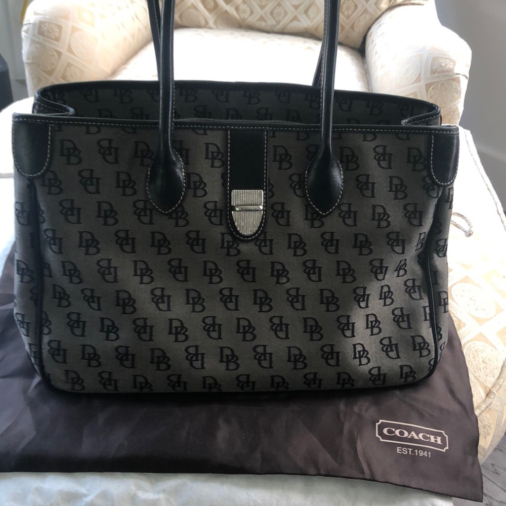 Large Dooney & Bourke bag with original duster.